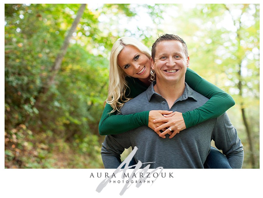 Future bride and groom pose at their Pisgah National Forest engagement session. © Aura Marzouk Photography, Greensboro Wedding Photographer