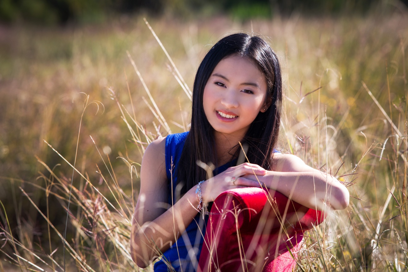 high-school-girl-senior-photos-houston-feild-tall-grass-flowers