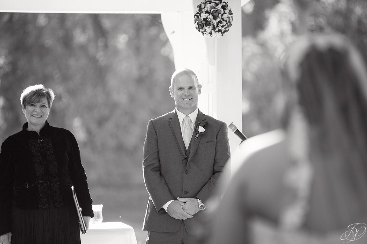groom seeing bride for first time at ceremony