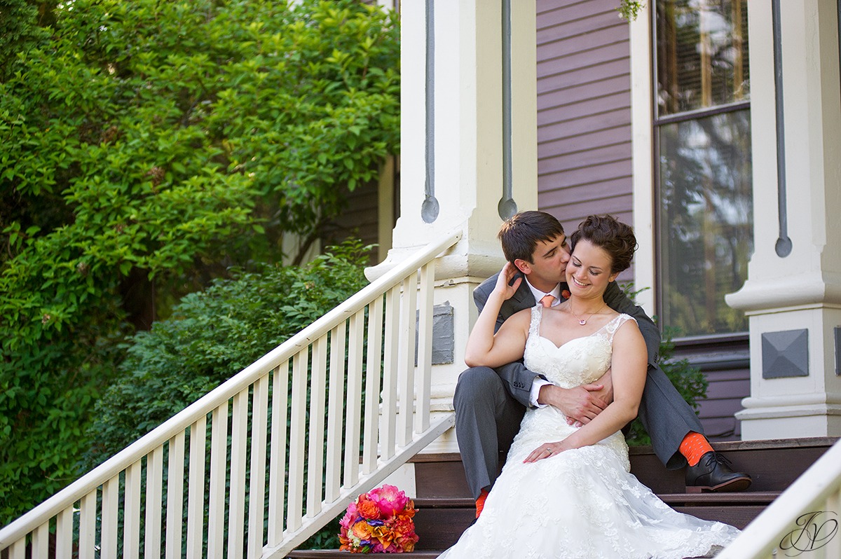 romantic photo of groom kissing bride