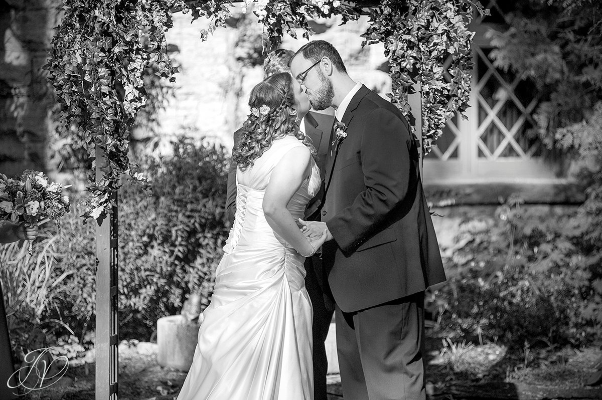 first kiss photo, just married, beardslee outdoor ceremony, beardlee castle ceremony site photo, beardslee castle outside ceremony. bridal party photos, bridal party with purple dresses, albany wedding photographer, capital region wedding photographers