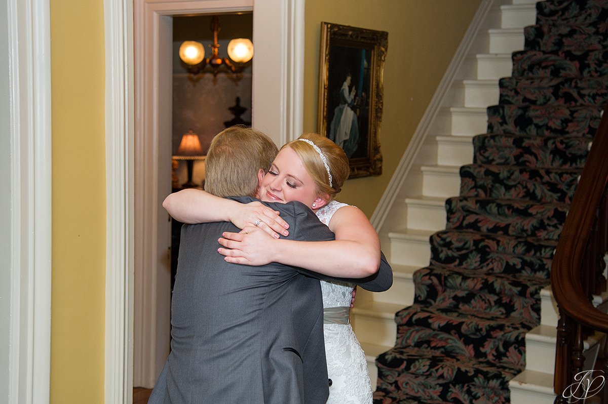 emotional moment between father and bride