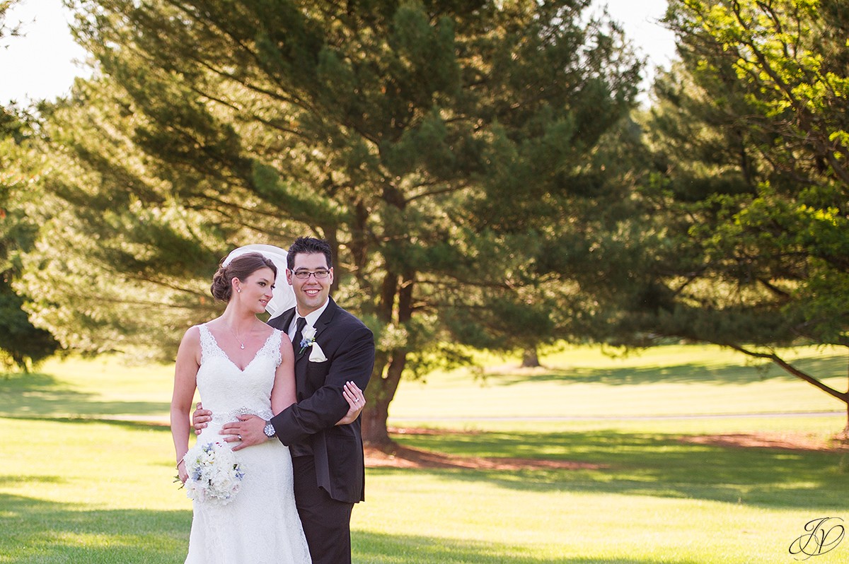 bride and groom golf course photo