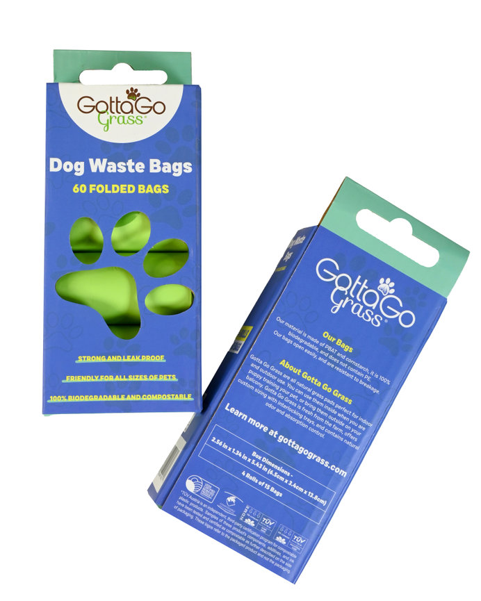 Dog waste bags packaging from GottaGoGrass, featuring 60 folded, biodegradable, and compostable bags.