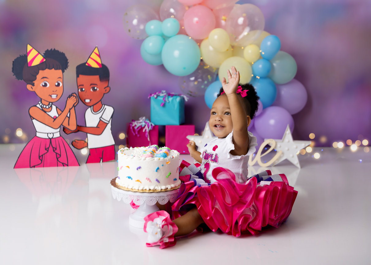 Cake smash photo session in Orlando by Andrea Ruff Studios - baby enjoying birthday cake