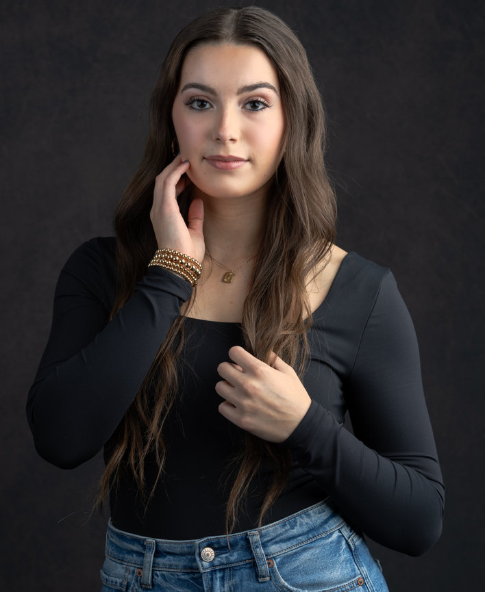 Charleston, SC Studo High School Senior Portrait on a black backdrop, image is created by Heather Johnson Photography