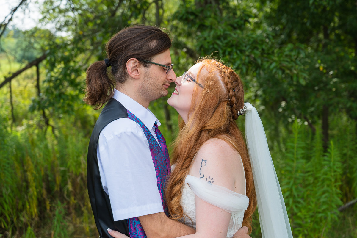 Newlyweds kissing at their wedding ceremony in Grove City PA