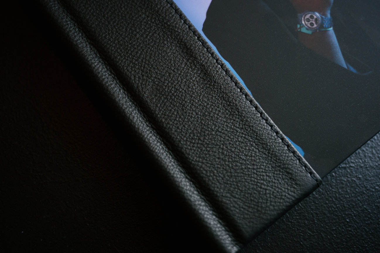 sleek black leather signature photo album from danielle renae photography for a senior guy