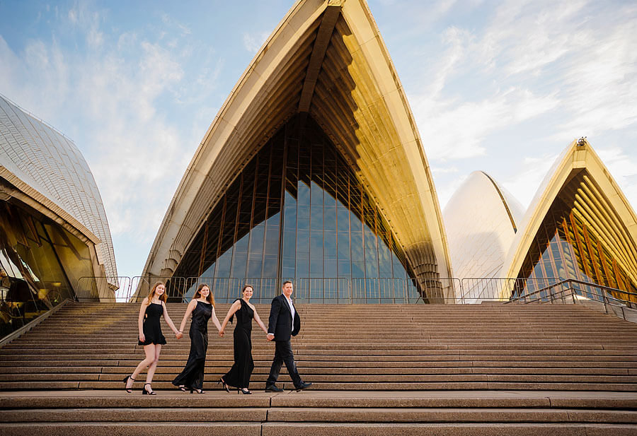 Portrait of a family walking during a Sydney Opera House Photoshoot with Sarah Iris Photography.
