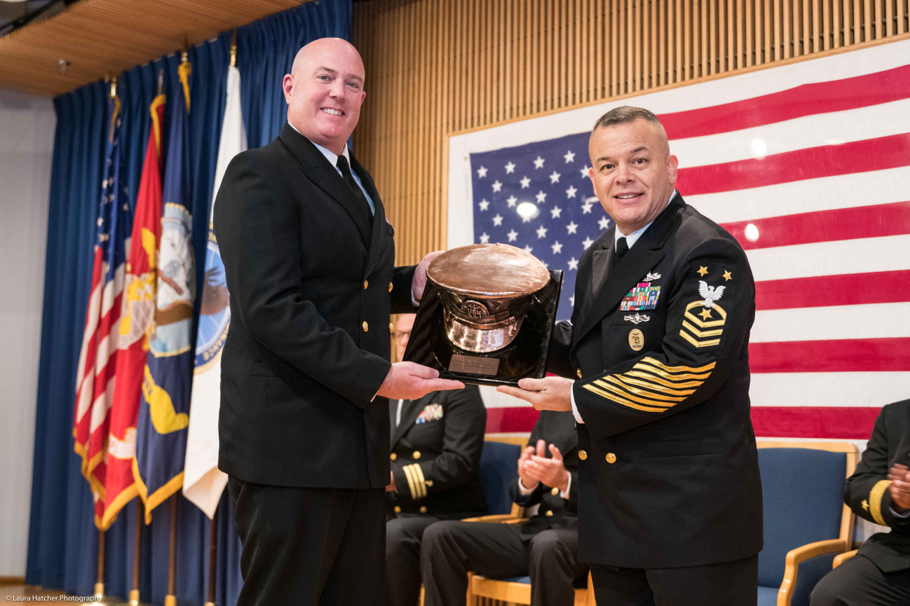 Two Navy Master Chiefs posing during a Navy Retirement Ceremony