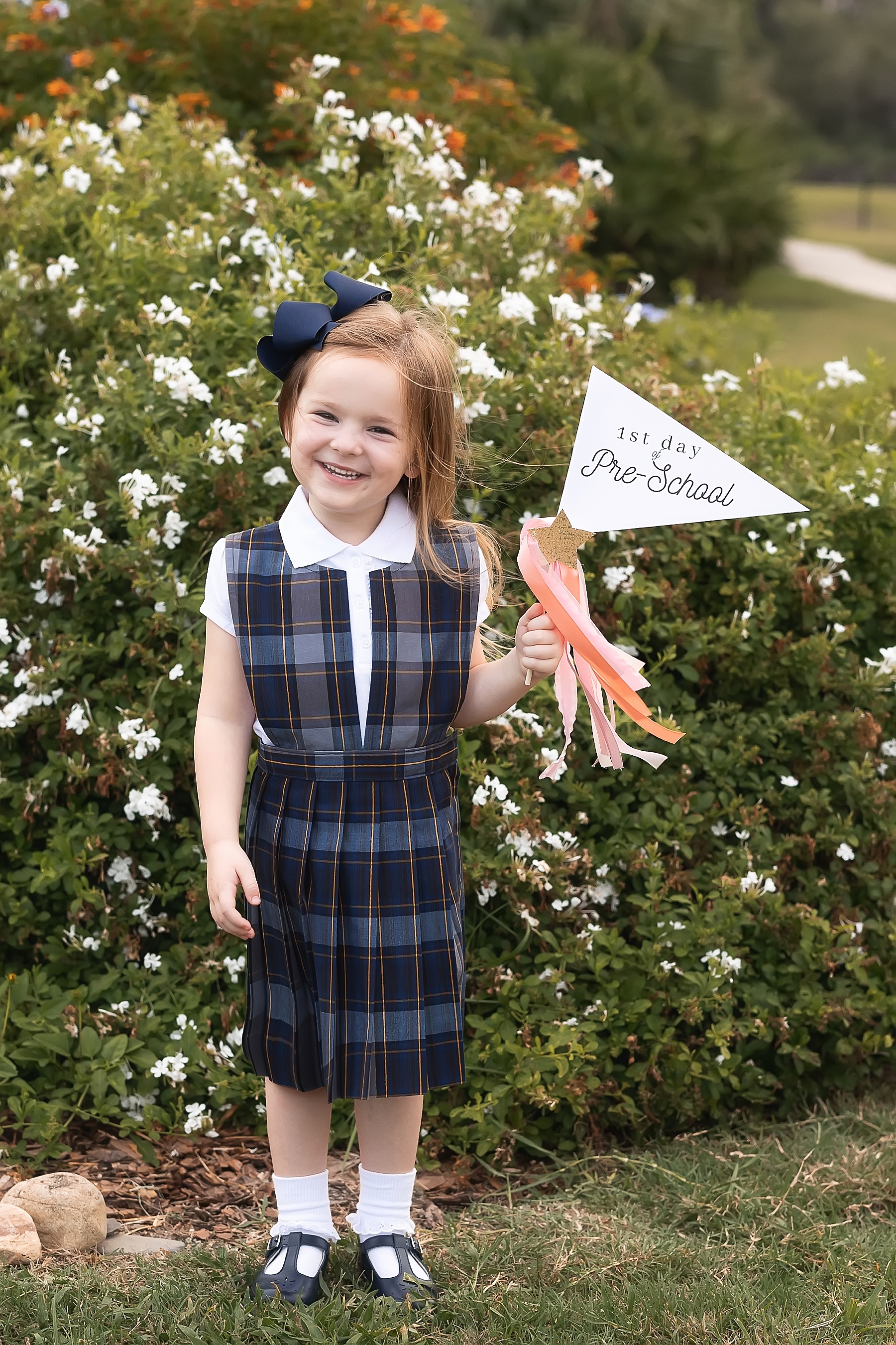 little girl with red hair dressed in paid on her first day of pre-school in st. Augustine Florida