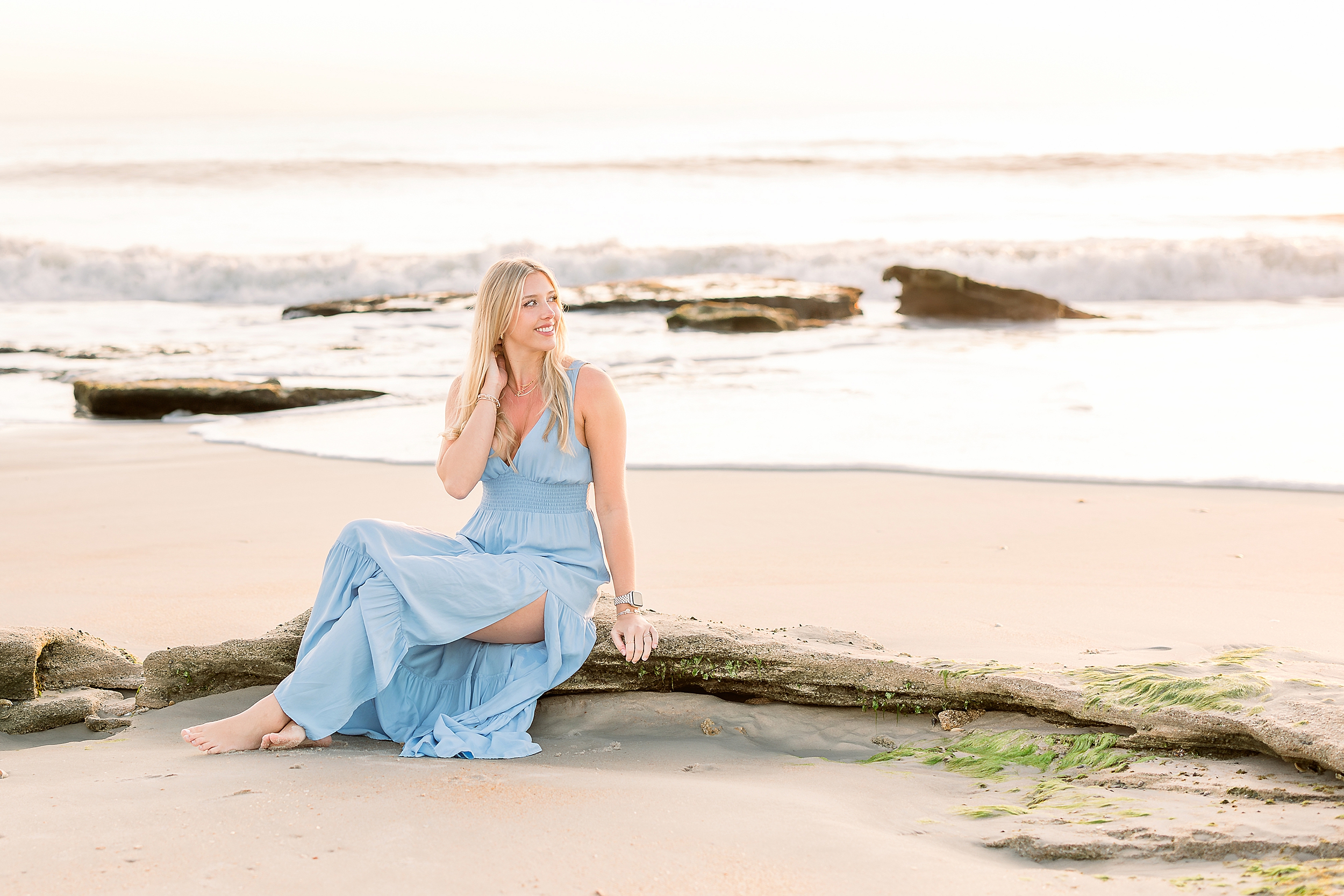 An airy grad session on the beach at sunrise in Saint Augustine.