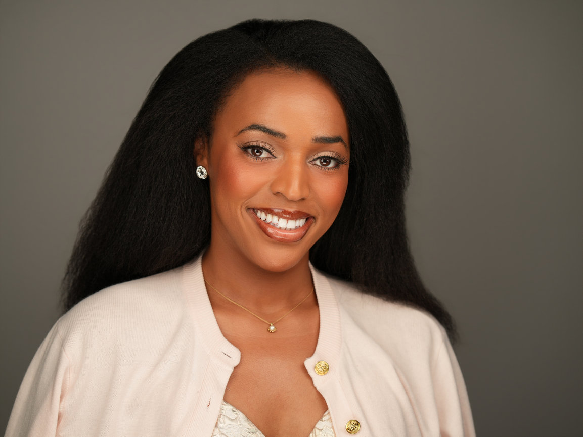 Executive-style professional headshot with studio lighting used for LinkedIn and corporate branding