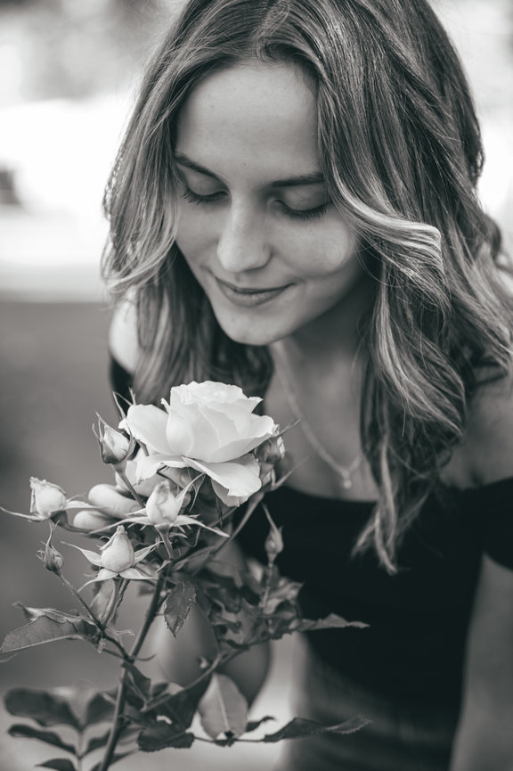 girl with flower senior year photo classic black and white Boise, Idaho