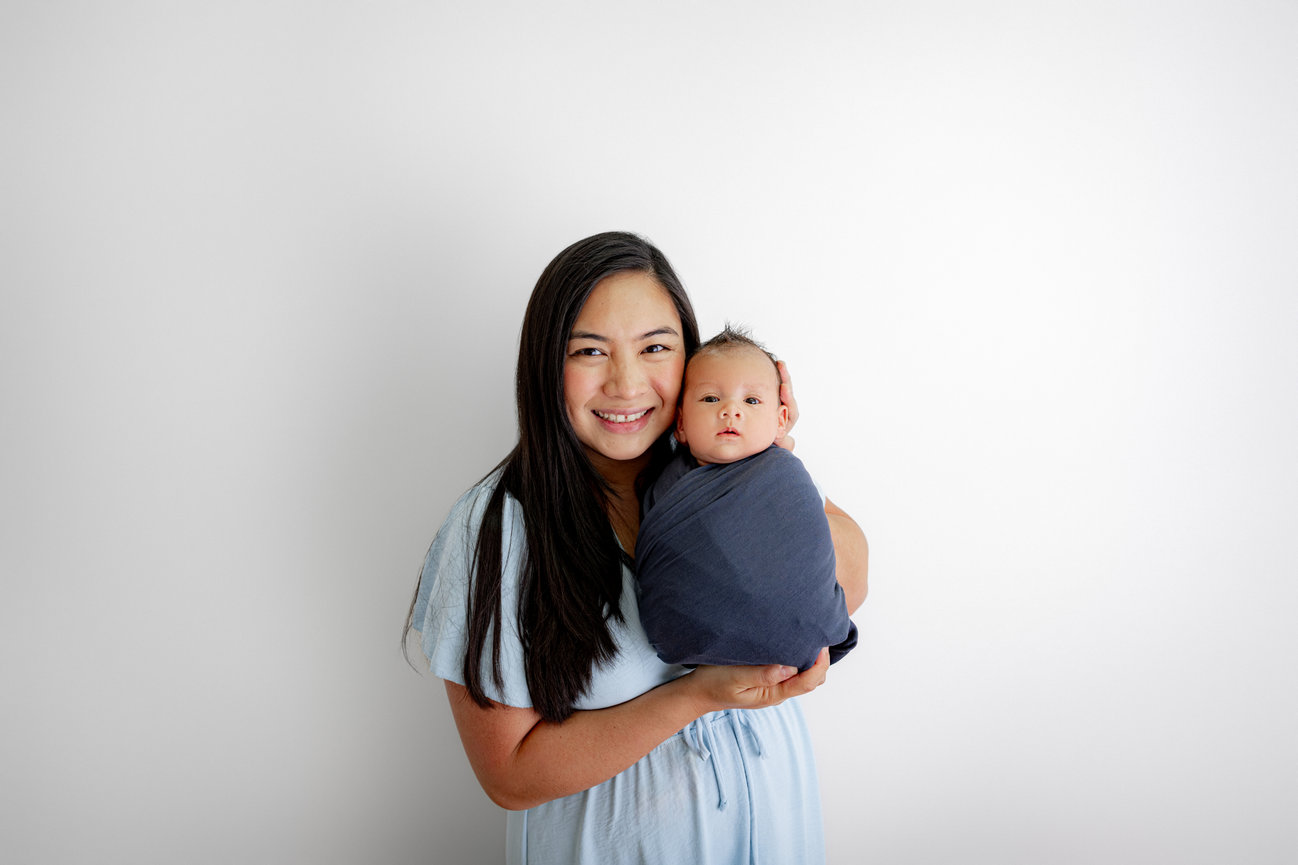 Newborn photography education for Houston families seeking a calm, professional in-home session with Photos by Elysia Janae.