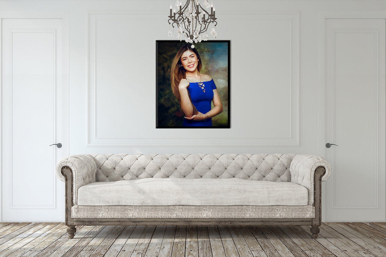 Elegant room with a tufted sofa, chandelier, and a portrait of a smiling woman in a blue dress on the wall.