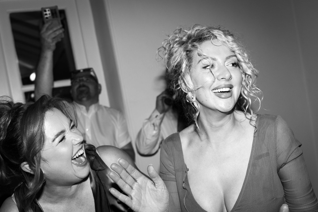 Editorial black & white flash photography at Iscoyd Park a candid, high-energy shot of wedding guests on the dance floor.
