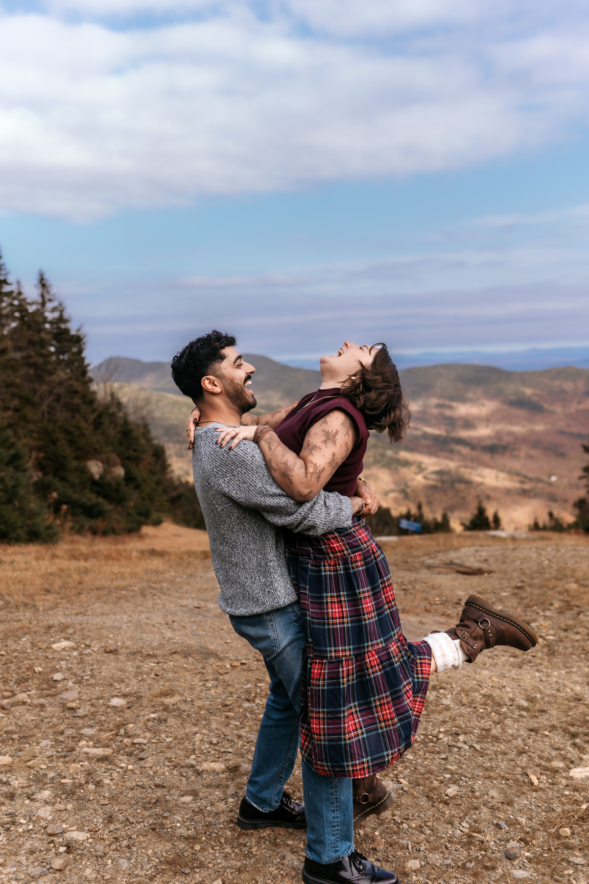 Couple celebrating their engagement on Mount Mansfield