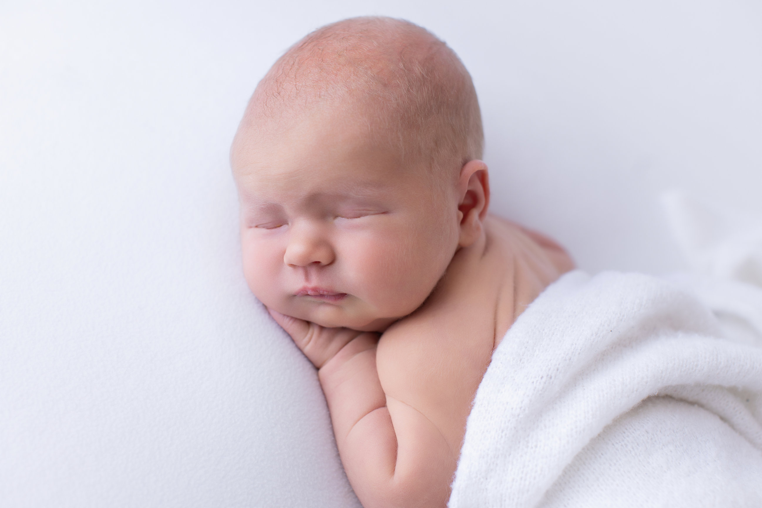 Calgary newborn photography white mauve and big brother love Newborn III session photo 2